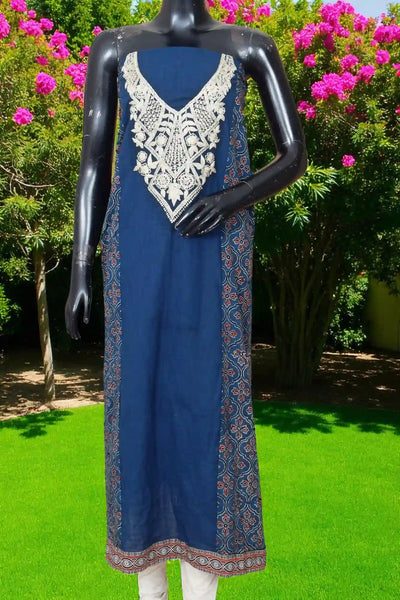 Ajrakh panelled cotton kurti with dori embroidery in traditional block print design.