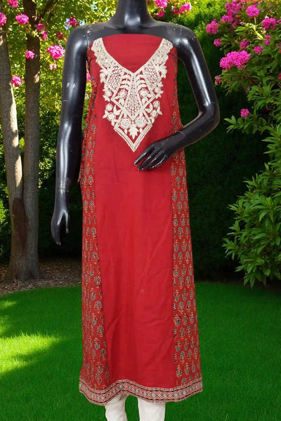 Ajrakh panelled cotton kurti with dori embroidery in traditional block print design.