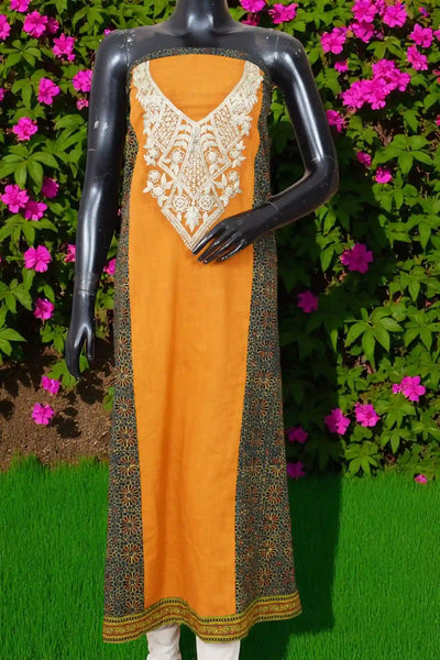 Ajrakh panelled cotton kurti with dori embroidery in traditional block print design.
