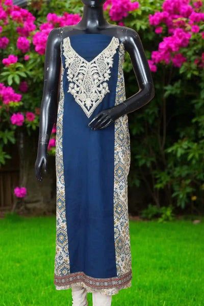 Ajrakh panelled cotton kurti with dori embroidery in traditional block print design.