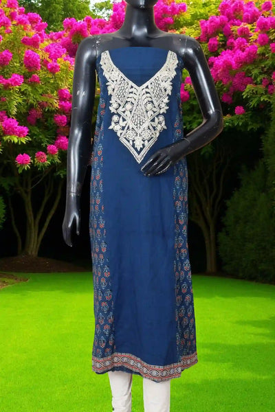 Ajrakh panelled cotton kurti with dori embroidery in traditional block print design.