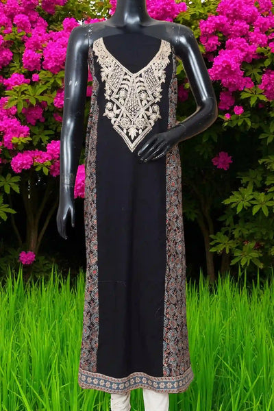 Ajrakh panelled cotton kurti with dori embroidery in traditional block print design.