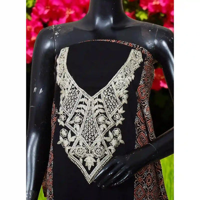 Ajrakh panelled cotton kurti with dori embroidery in traditional block print design.